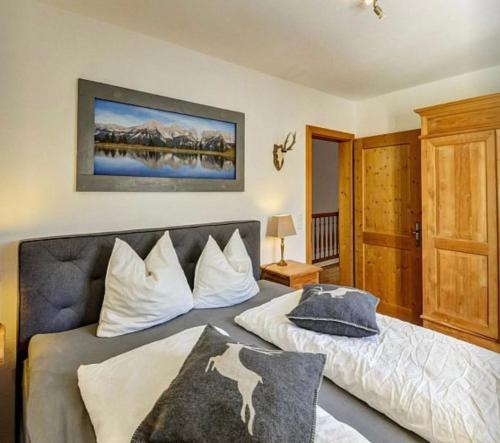 A bed or beds in a room at Alm'a Residence