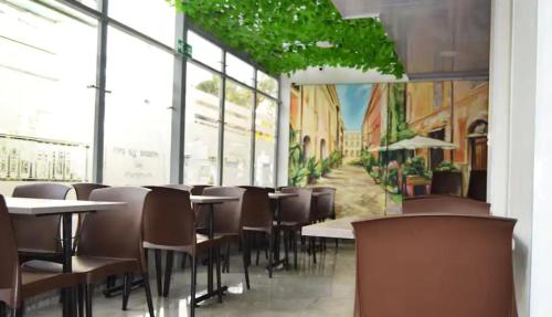 Restoran või mõni muu söögikoht majutusasutuses Hotel en Bogota - Fontana Di Trevi