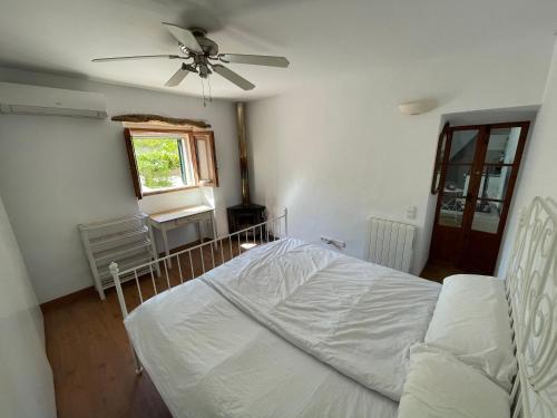 Ένα ή περισσότερα κρεβάτια σε δωμάτιο στο Casita rosa