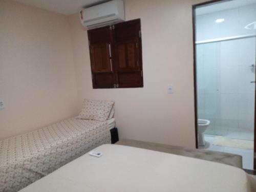 Koupelna v ubytování Casa Praia dos Milagres - 2 qtos sendo 1 suíte, piscina