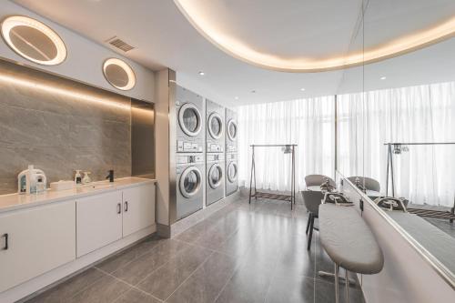 Γυμναστήριο ή/και όργανα γυμναστικής στο Atour Light Hotel Chengdu Wide-Narrow Alley