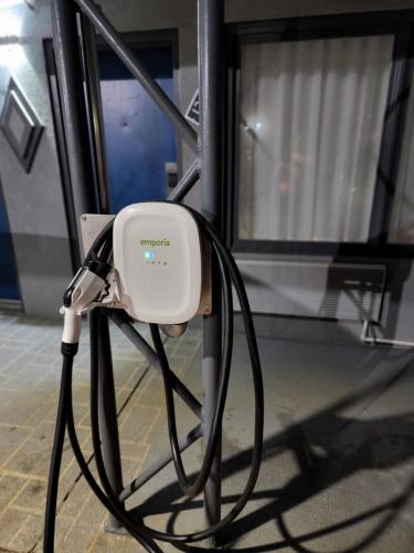 a white hair dryer sitting on a bus at Envi Boutique Hotel Henderson-Evansville South in Henderson