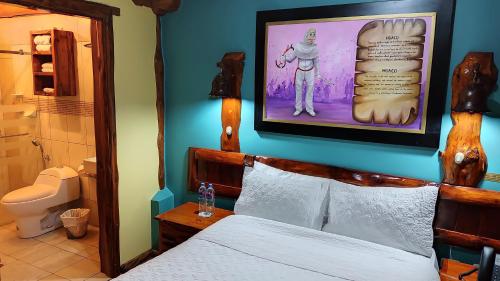 A bed or beds in a room at Hotel Maderanegra By Huasicama