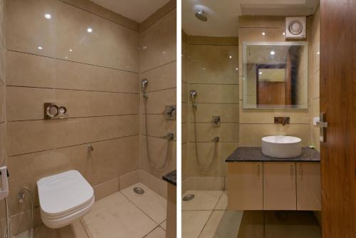 Ein Badezimmer in der Unterkunft Hotel Leo Saffron - Corporate Stay Pitampura