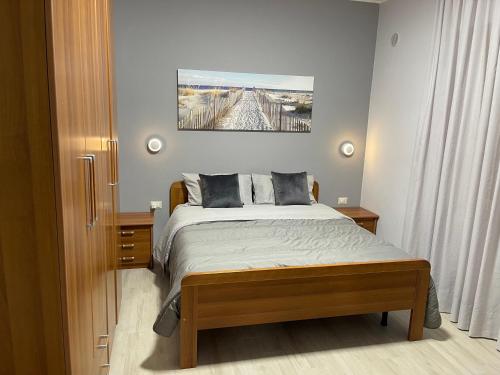 Postel nebo postele na pokoji v ubytování Appartamento nuovo super accessoriato sul mare