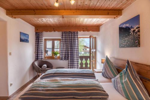 Postel nebo postele na pokoji v ubytování Haus Niklos - Wank