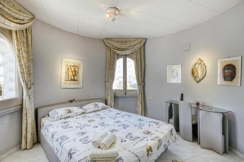 A bed or beds in a room at Villa Tordera