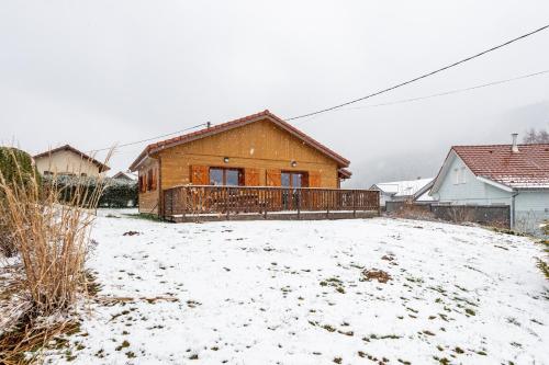 a house in a yard covered in snow at Macazoline in Xonrupt-Longemer