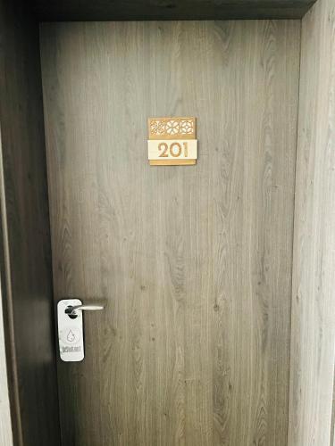 a door with a sign that says on it at Hotel Post Sindelfingen in Sindelfingen