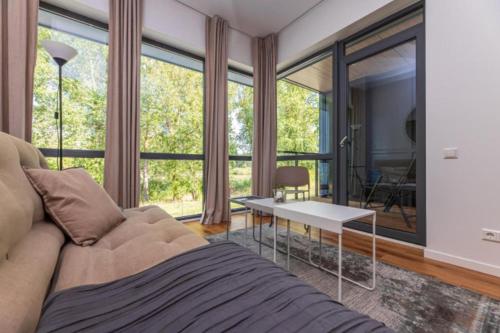 Posezení v ubytování Nature Vibe Apartment at Šventosios Vartai