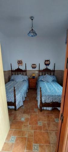 Katil atau katil-katil dalam bilik di Casa Los Tiznaos