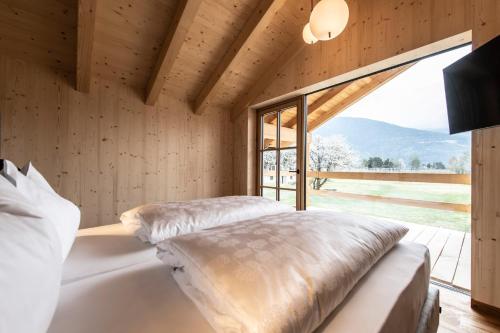 Postel nebo postele na pokoji v ubytování Kessler's Mountain Lodge