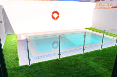 Bazén v ubytování Casa con piscina de agua salada I nebo v jeho okolí
