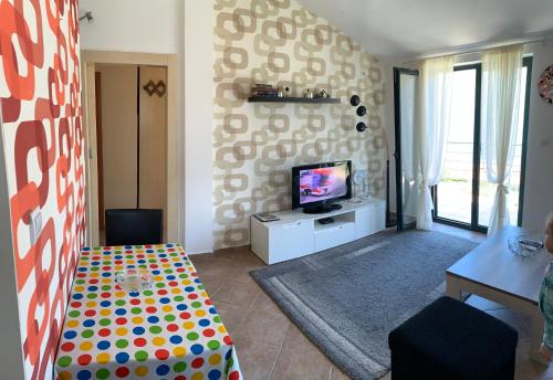 TV a/nebo společenská místnost v ubytování Apartman Barbara