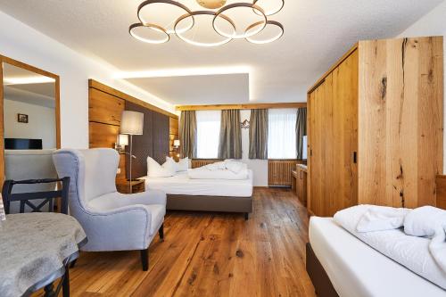 Postel nebo postele na pokoji v ubytování Hotel Rupertihof