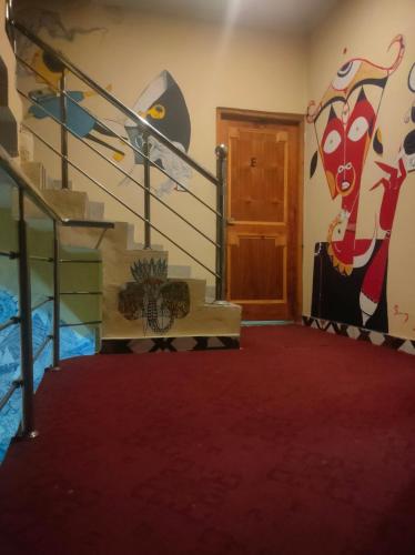 Ένα ή περισσότερα κρεβάτια σε δωμάτιο στο indian backpackers hostel