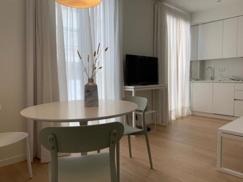 TV a/nebo společenská místnost v ubytování Apartamento Botánico, Centro de Granada