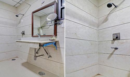 a bathroom with a sink and a shower at Itsy Hotels Hamlets Stay in Noida