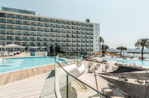 a hotel with a swimming pool and a resort at The Ibiza Twiins - 4* Sup in Playa d'en Bossa
