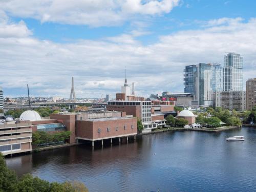 a view of a city with a river and buildings at The Royal Sonesta Boston in Cambridge