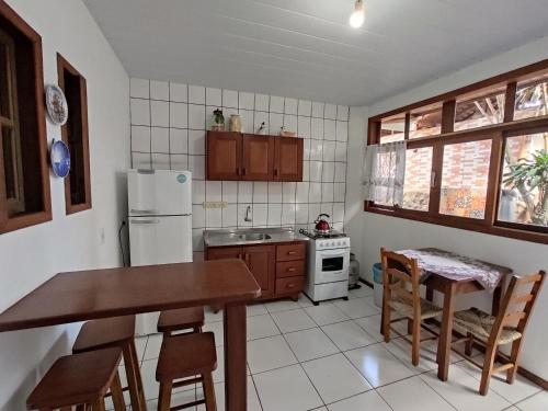 Kuchyň nebo kuchyňský kout v ubytování Pousada Capricórnio