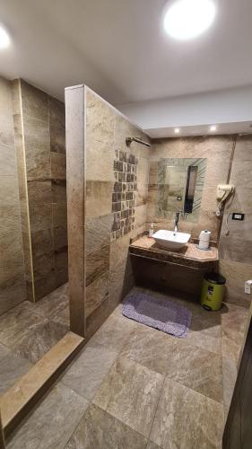 Ванна кімната в The Resort Studio - New Cairo