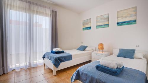 Ένα ή περισσότερα κρεβάτια σε δωμάτιο στο Luxury Villa Cindy