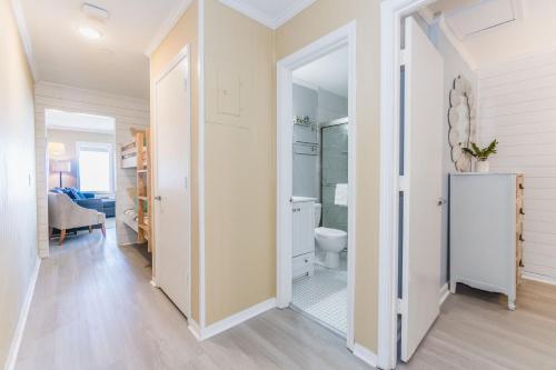 a hallway with a bathroom and a toilet at Stunning Views!!-Oceanfront Villa-Heated Pool-Private Balcony-Tiki Bar-Walk to Coligny Plaza in Hilton Head Island