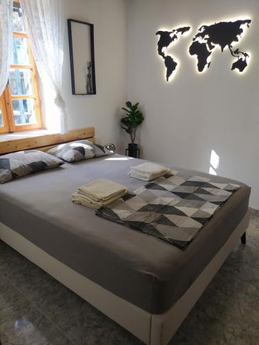 Postel nebo postele na pokoji v ubytování Olea House