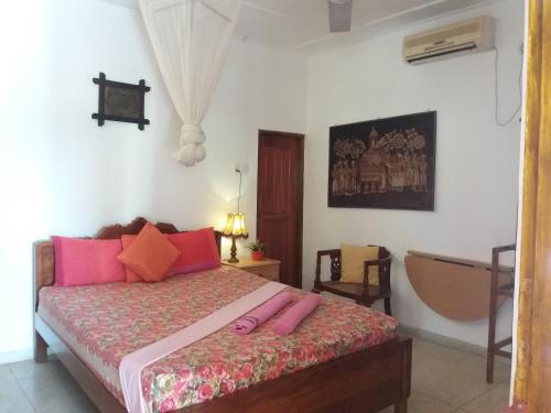 Postel nebo postele na pokoji v ubytování Embiente Guest House
