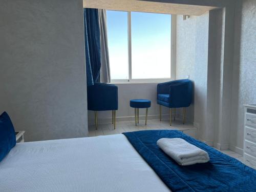 Postel nebo postele na pokoji v ubytování Ocean View Apartment with Airco