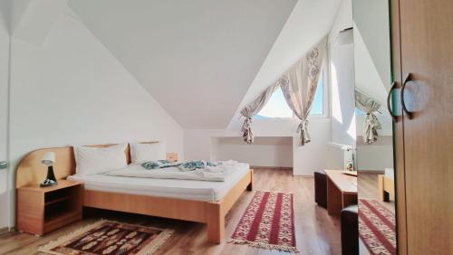 Letto o letti in una camera di MOTEL PRISLOP