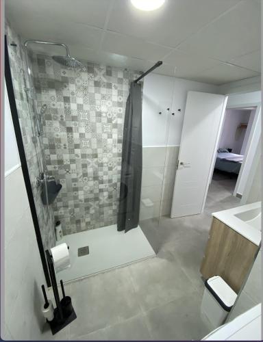 a bathroom with a shower and a sink at Morgan apartamentos Marbella centro in Marbella