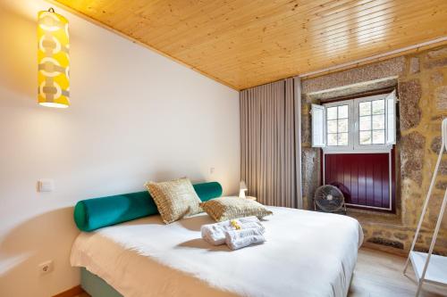 Llit o llits en una habitació de Casa do Rancho - Turismo Rural