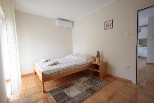 Кровать или кровати в номере Vila Vrnjački Raj