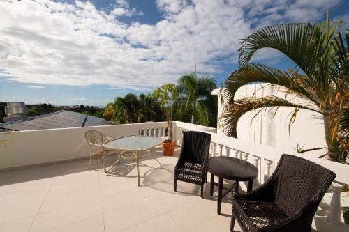 Ein Balkon oder eine Terrasse in der Unterkunft Lazy Parrot Inn