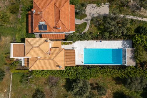Πισίνα στο ή κοντά στο SUN VILLA GLYFADA