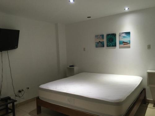 Posteľ alebo postele v izbe v ubytovaní Los Libertadores Paracas Beach House