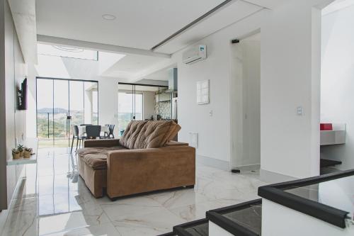 Posezení v ubytování Suite Luxo com Piscina Privativa e Jacuzzi