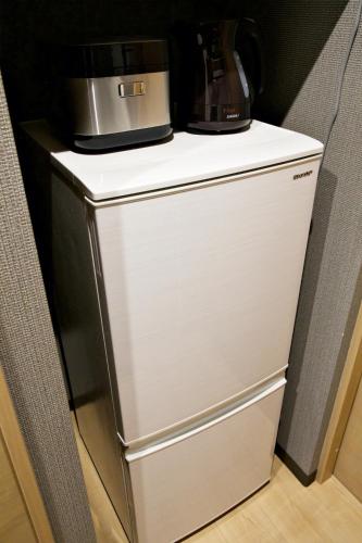 Dapur atau dapur kecil di メイスン倶楽部 安里 3階