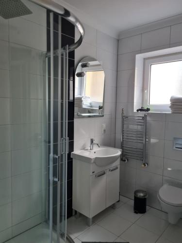 Koupelna v ubytování Apartament Centrum 3 Maja