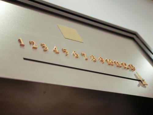 a group of birds sitting on top of a shelf at Hotel Monterey Ginza in Tokyo