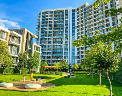 a view of a park with tall buildings at Menlyn Maine Residences - Superior king - Paris apartment in Pretoria