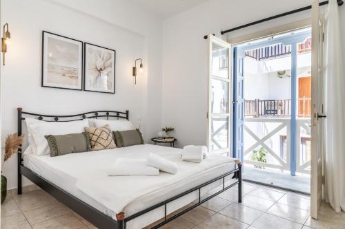 Un pat sau paturi într-o cameră la Jasmine guesthouse