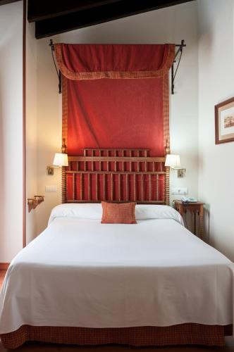 Cama o camas de una habitación en Hotel Murillo