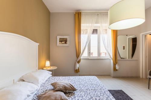 Postel nebo postele na pokoji v ubytování Il 49 Rooms Noto