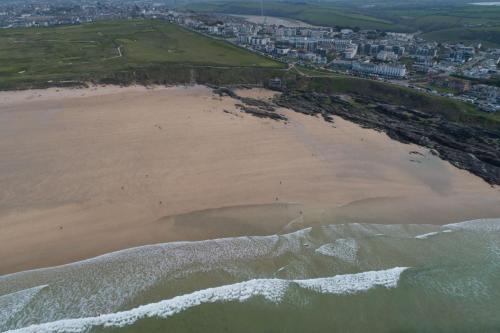 an aerial view of a beach with a city at 5 The Vista, Newquay in Newquay