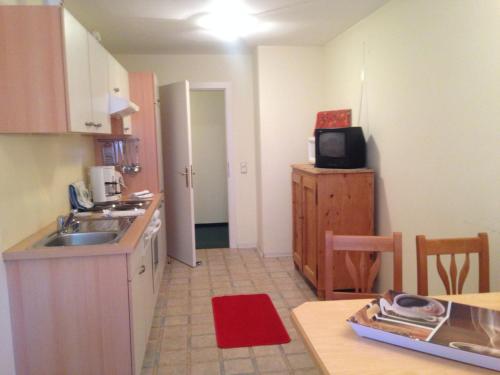 Η κουζίνα ή μικρή κουζίνα στο Appartements im Forsthaus