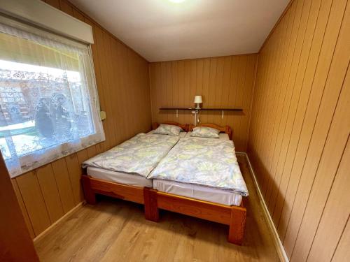 Letto o letti in una camera di Domki Rodzinny Wypoczynek