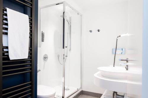 Hôtel Le Windsor Biarritzにあるバスルーム